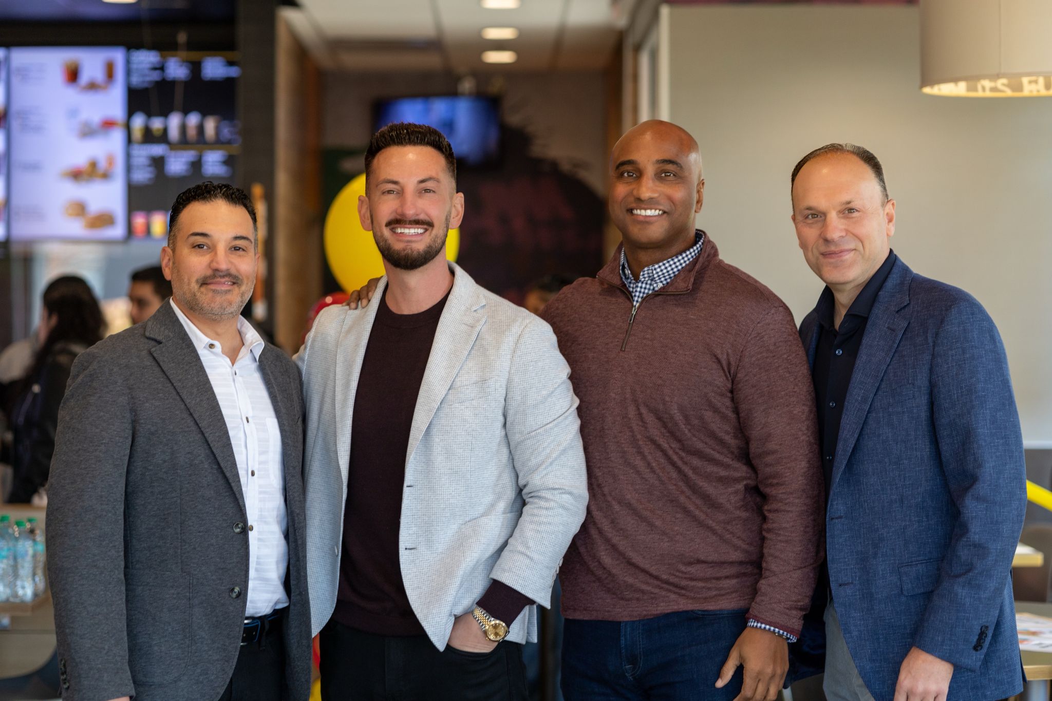 Joey with visiting McDonald's leaders