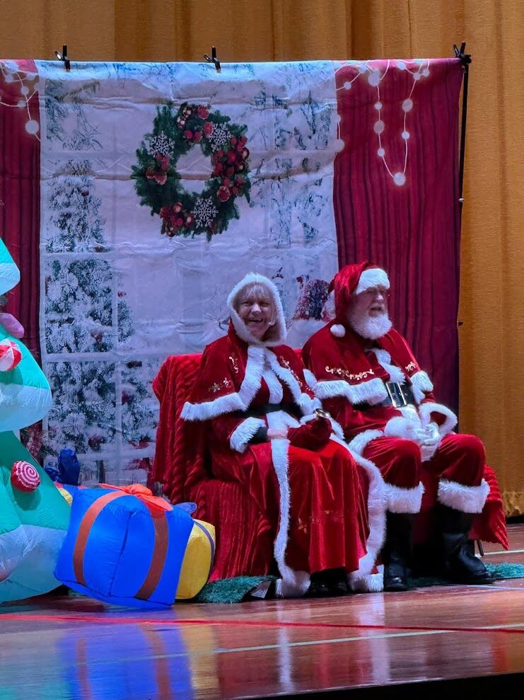 Santa and Mrs. Claus at the school holiday breakfast