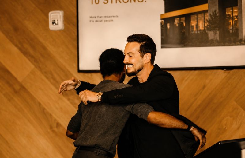 Two leaders embrace at the Day One summit