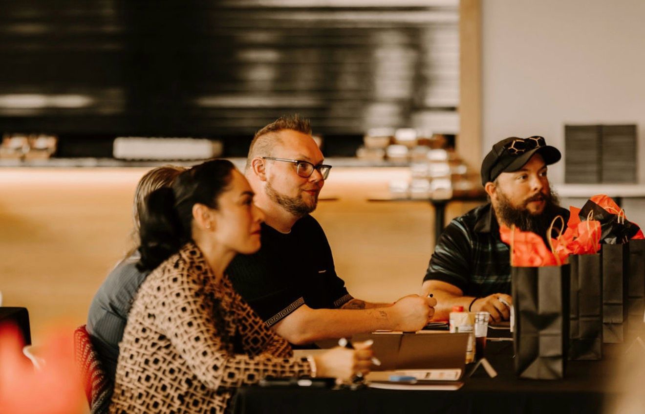 Three Northstar leaders listening during a session at the Day One Summit