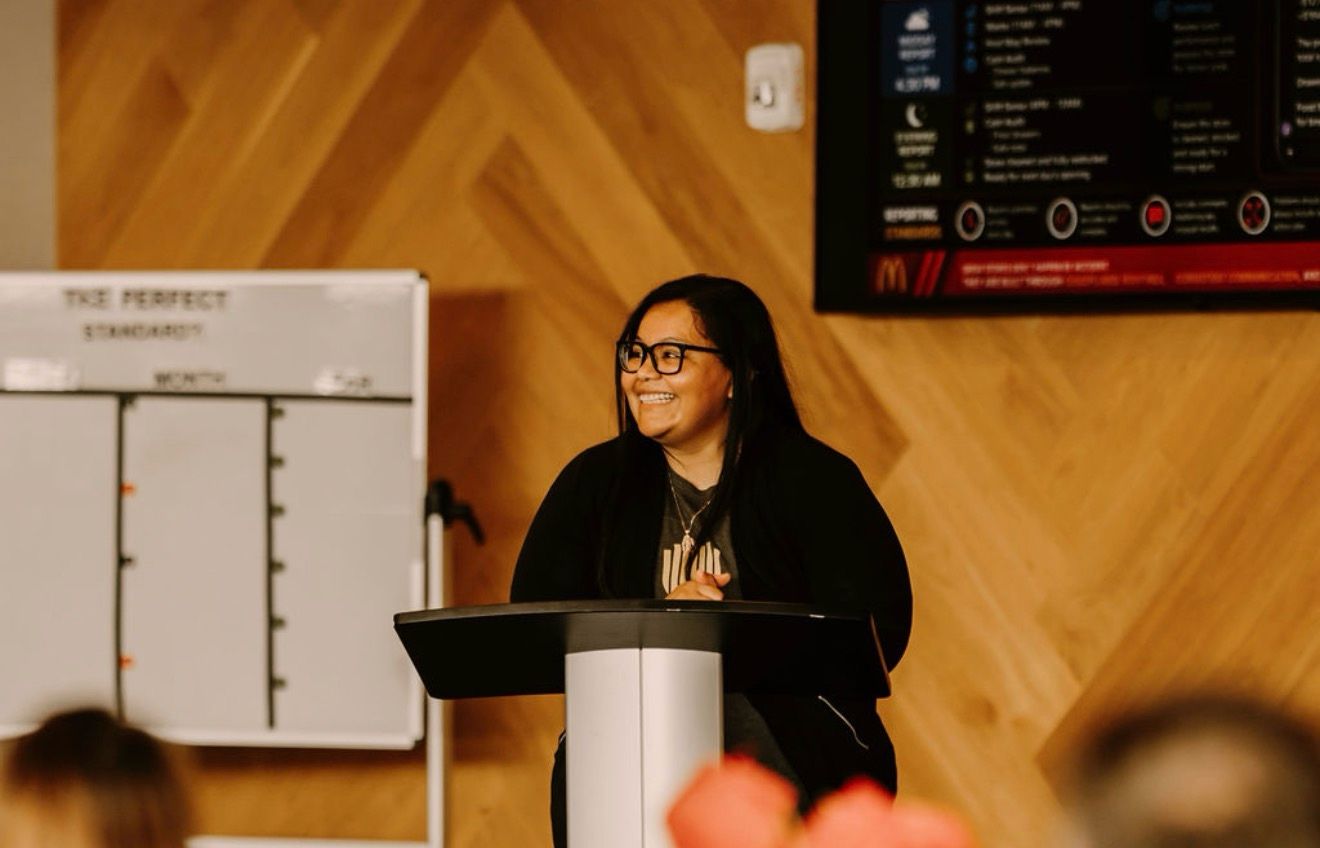 A Northstar leader speaking at the podium