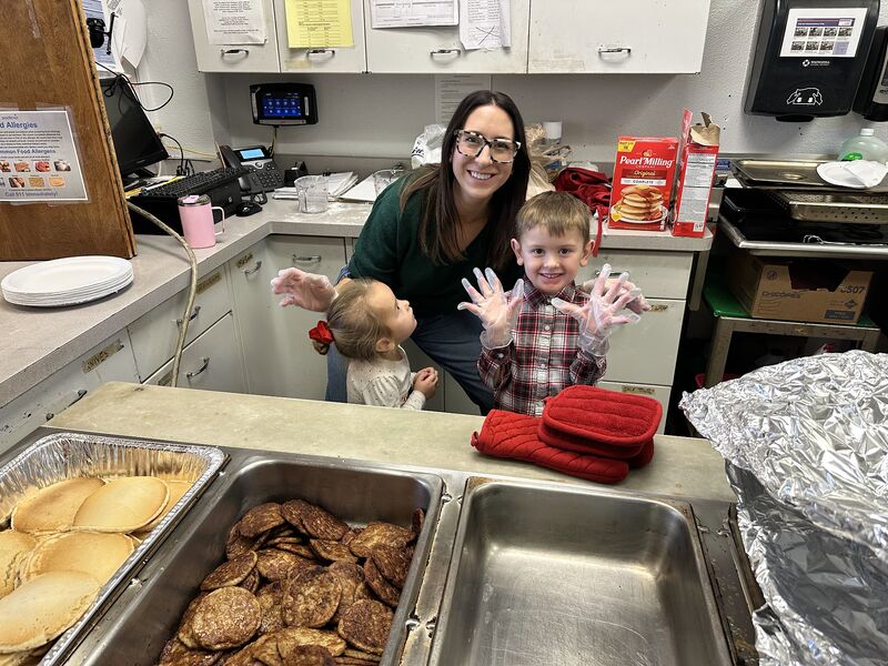 Serving breakfast in the school kitchen