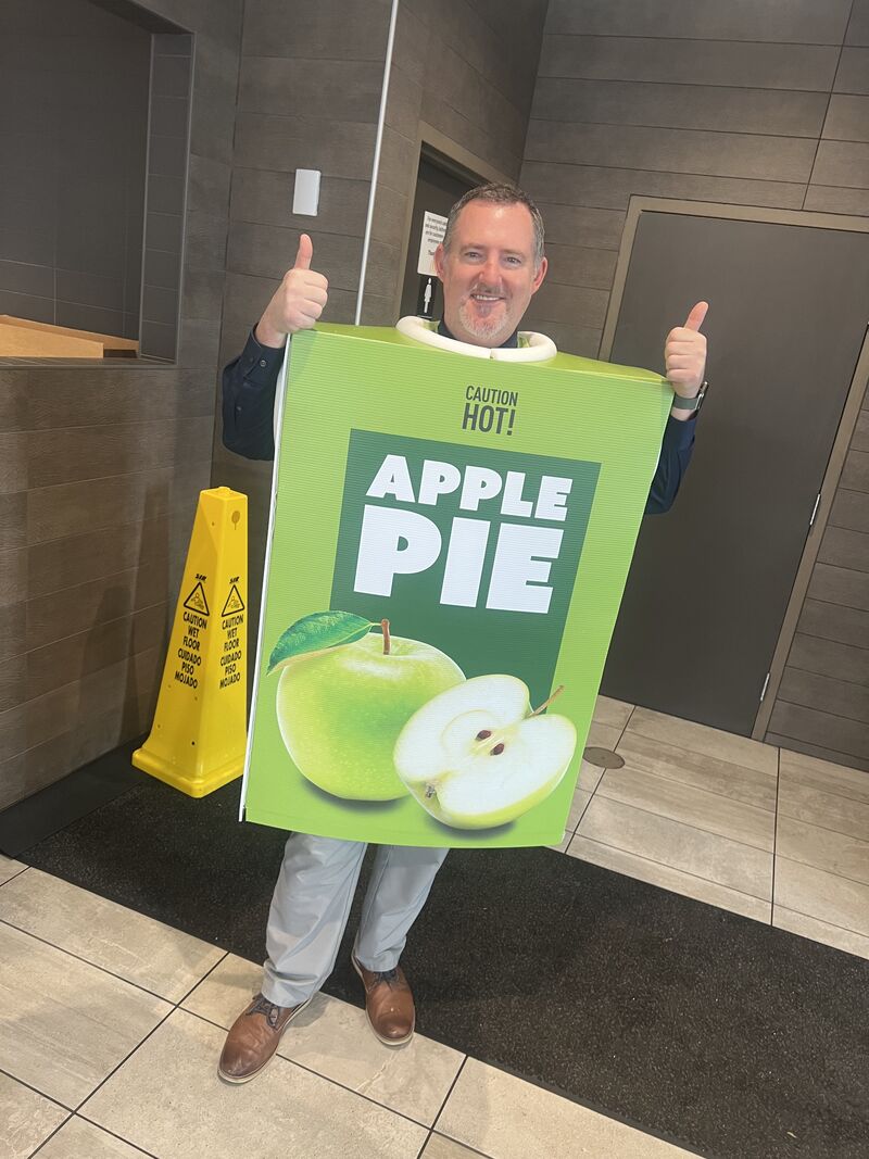 Thumbs up from the apple pie costume